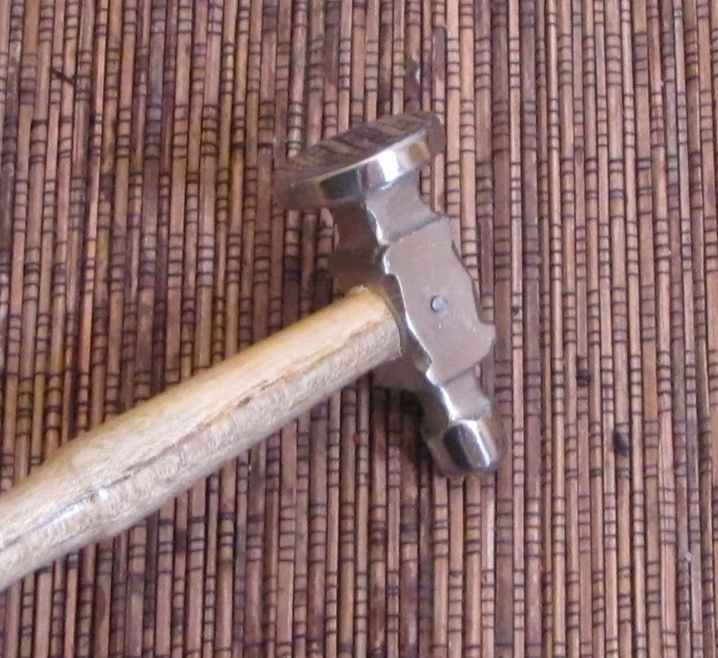 Polished steel flat, face size 1 1/8 inches, planishing chasing hammer, smoothing work, with ergo handle grip